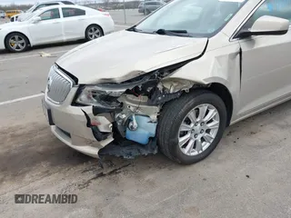2012 Buick LaCrosse Convenience with VIN 1G4GB5E39CF138545, listed as a IAAI auction lot 42073514 with 127,871 mi miles and . Bid and sale history available at DreamBid. Image 6.