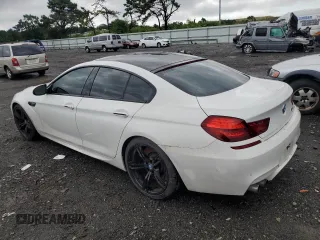 2015 BMW M6 z VIN WBS6C9C56FD467625, wystawiony jako Copart lot #64269363 z przebiegiem 92 698 mil mil oraz Nie do naprawy. Historia ofert i sprzedaży dostępna na DreamBid. Obrazek 2.