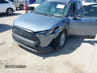 2023 Toyota Corolla Cross LE with VIN 7MUCAAAGXPV045651, listed as a IAAI auction lot 42006289 with 23,282 mi miles and . Bid and sale history available at DreamBid. Image 6.