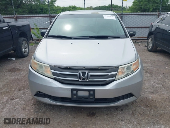 2012 Honda Odyssey EX-L with VIN 5FNRL5H66CB081323, listed as a IAAI auction lot 42465110 with 266,934 mi miles and . Bid and sale history available at DreamBid. Image 12.