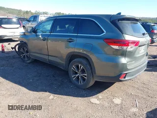2019 Toyota Highlander LE with VIN 5TDZZRFH2KS291289, listed as a IAAI auction lot 41561219 with 125,744 mi miles and . Bid and sale history available at DreamBid. Image 3.