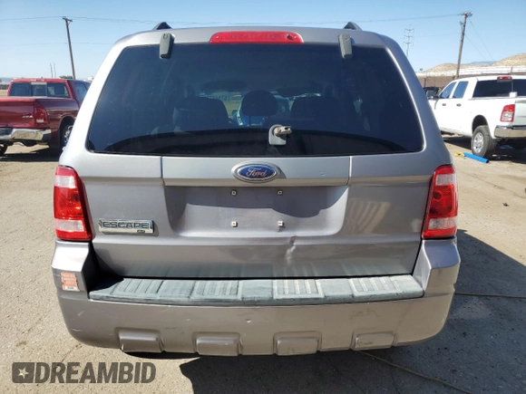 2008 Ford Escape XLT z VIN 1FMCU03158KA50345, wystawiony jako Copart lot #57349735 z przebiegiem 195 316 mil mil oraz Szkoda całkowita • Salvage title. Historia ofert i sprzedaży dostępna na DreamBid. Obrazek 6.