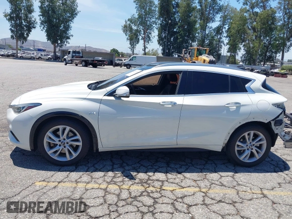 2018 Infiniti QX30 Premium z VIN SJKCH5CP5JA006199, wystawiony jako IAAI lot #42673215 z przebiegiem 107 294 mil mil oraz . Historia ofert i sprzedaży dostępna na DreamBid. Obrazek 15.