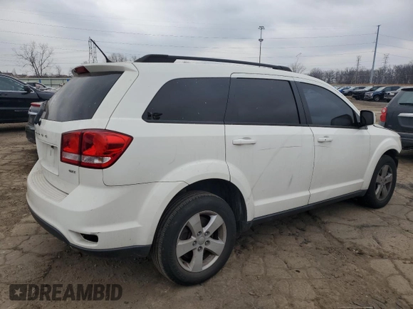 2012 Dodge Journey SXT with VIN 3C4PDCBG0CT331294, listed as a Copart auction lot 52066075 with 216,470 mi miles and Clean title. Bid and sale history available at DreamBid. Image 3.