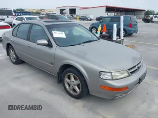 1999 Nissan Maxima GXE z VIN JN1CA21D6XT223369, wystawiony jako IAAI lot #42141361 z przebiegiem 210 781 mil mil oraz . Historia ofert i sprzedaży dostępna na DreamBid. Obrazek 1.