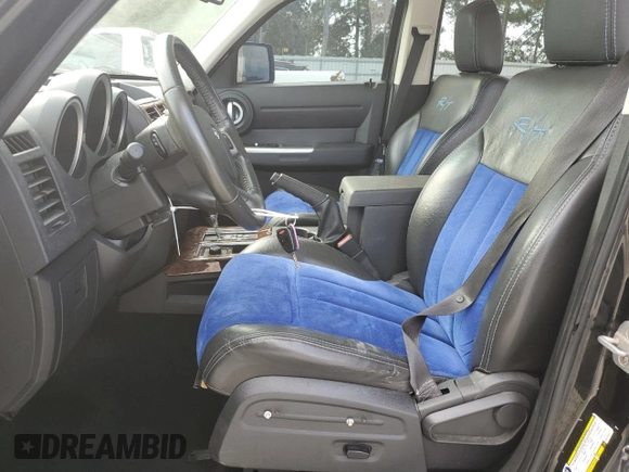 2008 Dodge Nitro R/T with VIN 1D8GU58658W124462, listed as a Copart auction lot 68324264 with 151,789 mi miles and Salvage Title. Bid and sale history available at DreamBid. Image 7.