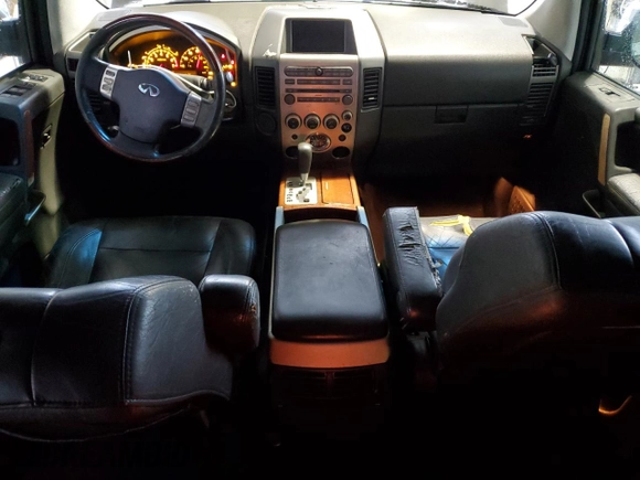 2006 Infiniti QX56 z VIN 5N3AA08A96N800292, wystawiony jako Copart lot #42050855 z przebiegiem 305 926 mil mil oraz Czysty tytuł • Clean title. Historia ofert i sprzedaży dostępna na DreamBid. Obrazek 8.