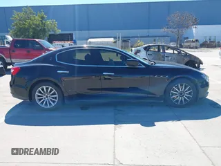 2014 Maserati Ghibli z VIN ZAM57XSA5E1091490, wystawiony jako IAAI lot #41848480 z przebiegiem 129 585 mil mil oraz . Historia ofert i sprzedaży dostępna na DreamBid. Obrazek 13.