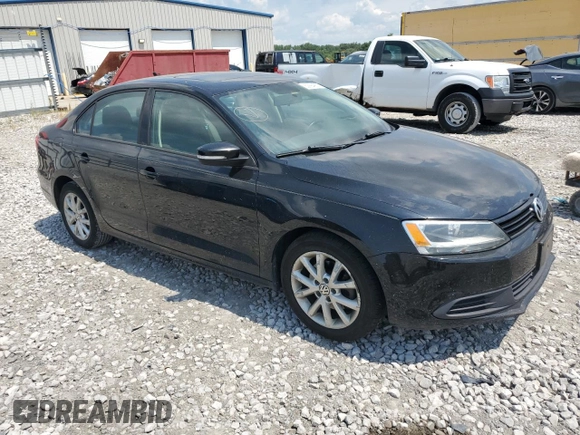 2012 Volkswagen Jetta SE with VIN 3VWDX7AJ3CM064030, listed as a Copart auction lot 62994955 with 185,770 mi miles and Salvage title. Bid and sale history available at DreamBid. Image 4.