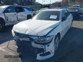 2014 BMW 4 Series 428i xDrive with VIN WBA3N5C56EF716566, listed as a IAAI auction lot 41245322 with 72,252 mi miles and . Bid and sale history available at DreamBid. Image 2.