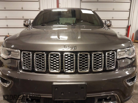 2017 Jeep Grand Cherokee Overland z VIN 1C4RJFCG6HC641812, wystawiony jako IAAI lot #42053404 z przebiegiem 129 184 mil mil oraz . Historia ofert i sprzedaży dostępna na DreamBid. Obrazek 6.