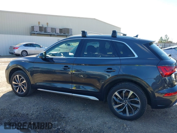 2021 Audi Q5 Premium Plus z VIN WA1BAAFY6M2013249, wystawiony jako IAAI lot #38681569 z przebiegiem 68 694 mil mil oraz . Historia ofert i sprzedaży dostępna na DreamBid. Obrazek 14.