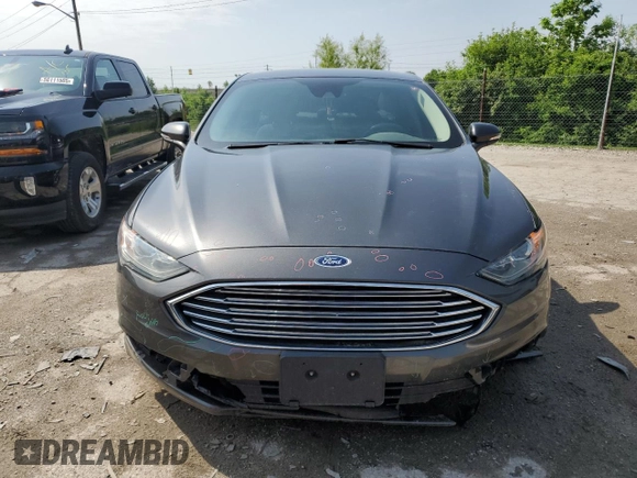 2017 Ford Fusion SE with VIN 3FA6P0H73HR375115, listed as a Copart auction lot 56625285 with 121,725 mi miles and Salvage title. Bid and sale history available at DreamBid. Image 5.