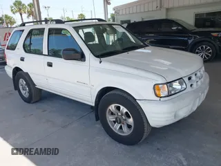 2000 Isuzu Rodeo S z VIN 4S2CK58WXY4317404, wystawiony jako IAAI lot #42261101 z przebiegiem 192 918 mil mil oraz . Historia ofert i sprzedaży dostępna na DreamBid. Obrazek 1.
