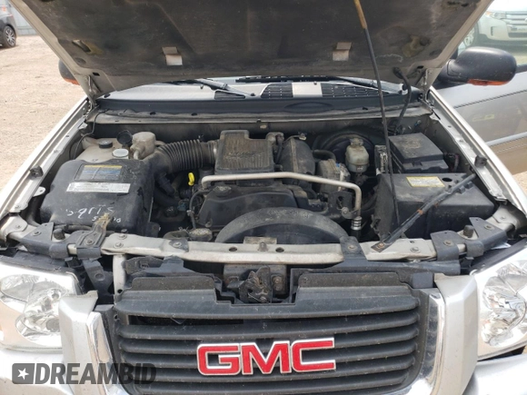 2004 GMC Envoy SLT with VIN 1GKDT13S842439635, listed as a Copart auction lot 63317194 with 201,672 mi miles and Salvage Title. Bid and sale history available at carsss.com. Image 12.