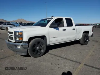 2015 Chevrolet Silverado 1500 LT with VIN 1GCRCRECXFZ223432, listed as a Copart auction lot 50058405 with 132,215 mi miles and Salvage Title. Bid and sale history available at carsss.com. Image 1.