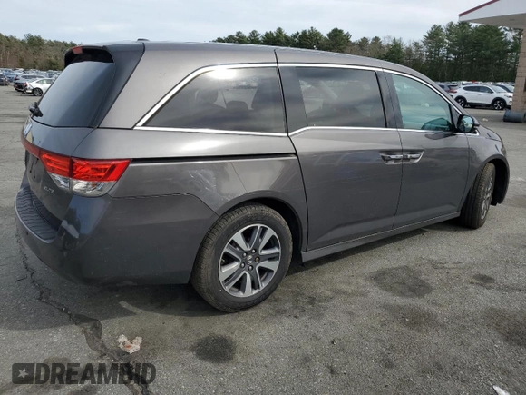 2015 Honda Odyssey Touring Elite with VIN 5FNRL5H95FB117971, listed as a Copart auction lot 52083475 with 82,626 mi miles and Salvage Title. Bid and sale history available at DreamBid. Image 3.