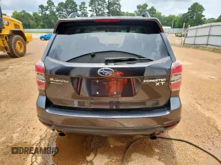 2014 Subaru Forester XT Touring with VIN JF2SJGPC6EH511379, listed as a Copart auction lot 58521725 with 152,744 mi miles and Clean title. Bid and sale history available at DreamBid. Image 6.