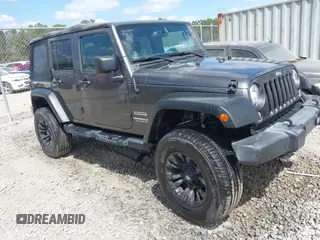 2017 Jeep Wrangler Unlimited Sport with VIN 1C4BJWDG6HL517779, listed as a IAAI auction lot 42134534 with 128,701 mi miles and . Bid and sale history available at DreamBid. Image 1.
