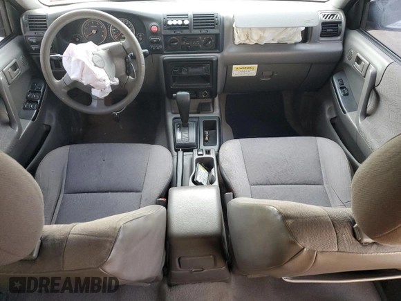 2003 Isuzu Rodeo with VIN 4S2DM58W034303129, listed as a Copart auction lot 83757734 with 114,274 mi miles and Salvage Title. Bid and sale history available at DreamBid. Image 8.