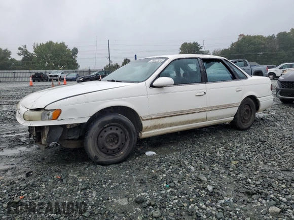 1994 Ford Taurus GL z VIN 1FALP52U5RA152732, wystawiony jako Copart lot #70472324 z przebiegiem 52 781 mil mil oraz Szkoda całkowita • Salvage title. Historia ofert i sprzedaży dostępna na DreamBid. Obrazek 1.