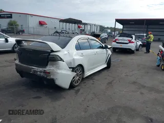 2011 Mitsubishi Lancer Evolution GSR with VIN JA32W8FV9BU045781, listed as a IAAI auction lot 41308314 with 102,840 mi miles. Bid and sale history available at carsss.com. Image 4.