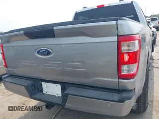 2022 Ford F-150 XL with VIN 1FTFW1E52NFA73233, listed as a IAAI auction lot 42311048 with 14,298 mi miles and . Bid and sale history available at DreamBid. Image 16.