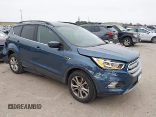 2018 Ford Escape SE with VIN 1FMCU0GD0JUC58115, listed as a IAAI auction lot 41578309 with 76,162 mi miles. Bid and sale history available at carsss.com. Image 1.