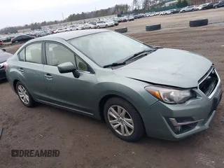 2015 Subaru Impreza Premium z VIN JF1GJAC65FH019578, wystawiony jako IAAI lot #41675318 z przebiegiem 74 769 mil mil oraz . Historia ofert i sprzedaży dostępna na DreamBid. Obrazek 13.