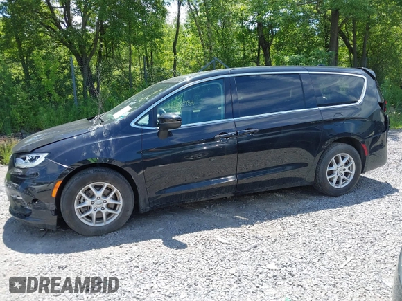 2023 Chrysler Pacifica Touring L with VIN 2C4RC1BG2PR534194, listed as a IAAI auction lot 42613934 with 69,896 mi miles and . Bid and sale history available at DreamBid. Image 14.