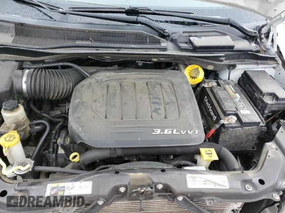2015 Dodge Grand Caravan American Value with VIN 2C4RDGBG0FR636219, listed as a Copart auction lot 54527235 with 95,175 mi miles and Salvage Title. Bid and sale history available at DreamBid. Image 12.