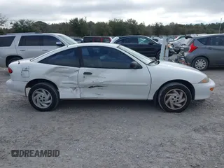 1998 Chevrolet Cavalier with VIN 1G1JC1247W7219113, listed as a IAAI auction lot 41371201 with 52,439 mi miles. Bid and sale history available at carsss.com. Image 13.