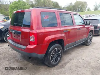 2015 Jeep Patriot Sport with VIN 1C4NJRBB3FD136291, listed as a IAAI auction lot 42015702 with 129,339 mi miles and . Bid and sale history available at carsss.com. Image 4.
