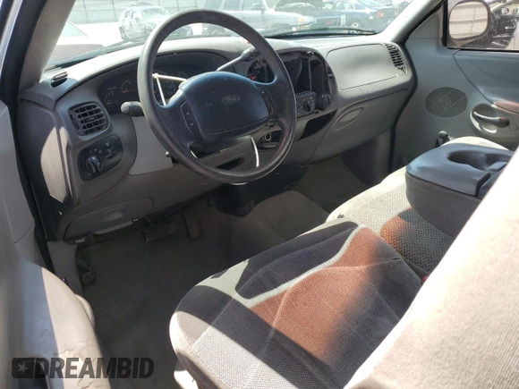 1997 Ford F-150 с VIN 1FTDX1769VNC17277, выставлен на аукционе Copart как лот 59754995 с пробегом 190 116 миль миль и Списание • Salvage title. История ставок и продаж доступна на DreamBid. Изображение 8.