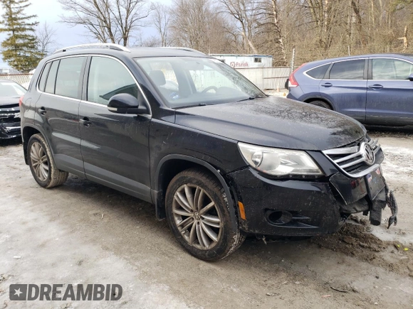 2011 Volkswagen Tiguan SEL with VIN WVGBV7AX4BW553986, listed as a Copart auction lot 43873765 with 140,097 mi miles and Salvage Title. Bid and sale history available at DreamBid. Image 4.