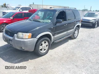 2002 Ford Escape XLT Choice with VIN 1FMYU03112KC99920, listed as a IAAI auction lot 42687111 with 172,920 mi miles and . Bid and sale history available at DreamBid. Image 2.