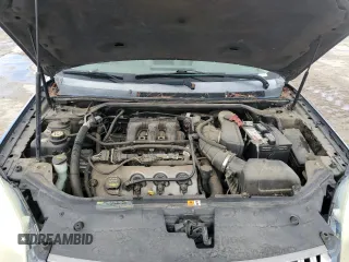 2009 Mercury Sable with VIN 1MEHM40W19G633435, listed as a Copart auction lot 49274275 with 172,223 mi miles and Salvage title. Bid and sale history available at DreamBid. Image 11.