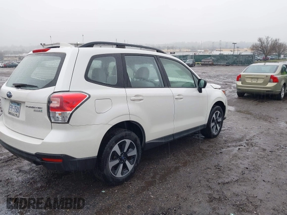 2017 Subaru Forester with VIN JF2SJABC7HH591087, listed as a IAAI auction lot 41858995 with Not Provided miles and . Bid and sale history available at DreamBid. Image 4.
