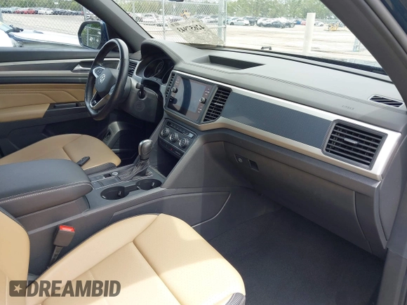 2021 Volkswagen Atlas SE with VIN 1V2PE2CA7MC201509, listed as a IAAI auction lot 42657943 with 71,197 mi miles and . Bid and sale history available at DreamBid. Image 5.