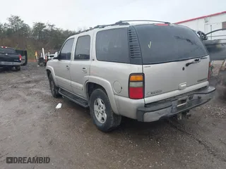 2004 Chevrolet Tahoe LT with VIN 1GNEC13Z24R160211, listed as a IAAI auction lot 41465076 with 229,612 mi miles. Bid and sale history available at carsss.com. Image 3.