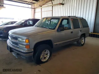 1999 Chevrolet Tahoe Z71 with VIN 1GNEK13R2XJ304328, listed as a Copart auction lot 50267915 with 0 mi miles and Salvage Title. Bid and sale history available at carsss.com. Image 1.