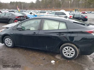 2016 Toyota Prius Two with VIN JTDKBRFU2G3523028, listed as a IAAI auction lot 41709054 with 101,496 mi miles. Bid and sale history available at carsss.com. Image 14.
