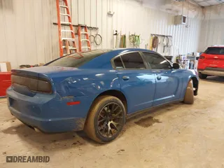 2014 Dodge Charger Police with VIN 2C3CDXAT5EH218901, listed as a IAAI auction lot 41723531 with 216,643 mi miles. Bid and sale history available at carsss.com. Image 4.