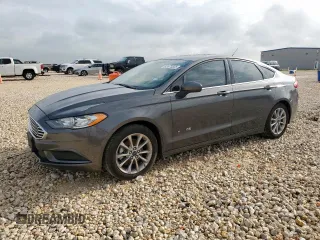 2017 Ford Fusion Hybrid SE with VIN 3FA6P0LU7HR318039, listed as a Copart auction lot 63575325 with 106,355 mi miles and Salvage title. Bid and sale history available at DreamBid. Image 1.