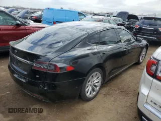 2016 Tesla Model S 70 with VIN 5YJSA1E11GF155536, listed as a Copart auction lot 47543565 with 137,462 mi miles and Salvage title. Bid and sale history available at DreamBid. Image 3.