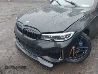 2020 BMW 3 Series M340i with VIN 3MW5U7J03L8B36115, listed as a IAAI auction lot 41957726 with 49,361 mi miles. Bid and sale history available at carsss.com. Image 6.