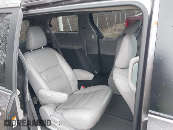 2015 Toyota Sienna Ltd with VIN 5TDDK3DCXFS100341, listed as a IAAI auction lot 41245558 with 114,854 mi miles. Bid and sale history available at carsss.com. Image 8.