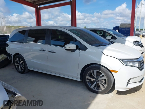 2021 Honda Odyssey Touring z VIN 5FNRL6H80MB003323, wystawiony jako IAAI lot #42303968 z przebiegiem 51 531 mil mil oraz . Historia ofert i sprzedaży dostępna na DreamBid. Obrazek 14.