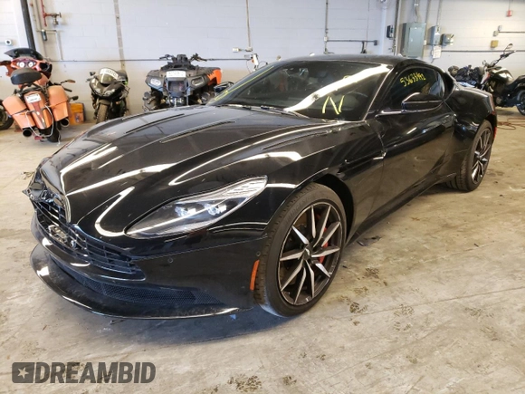 2017 Aston Martin DB11 z VIN SCFRMFAV9HGL02951, wystawiony jako Copart lot #53633992 z przebiegiem 28 066 mil mil oraz . Historia ofert i sprzedaży dostępna na DreamBid. Obrazek 2.