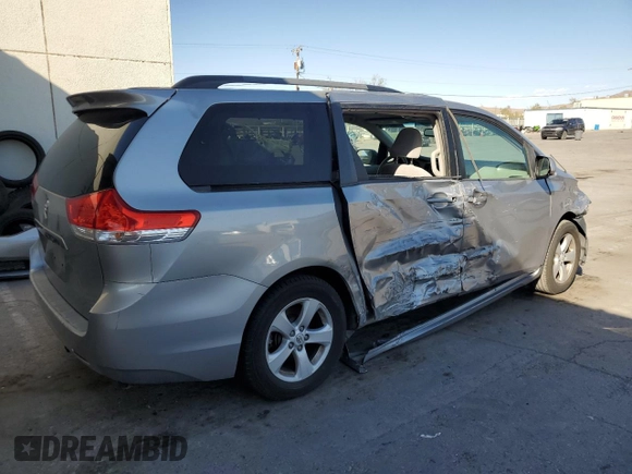 2012 Toyota Sienna LE AAS with VIN 5TDKK3DC8CS259085, listed as a Copart auction lot 73592584 with 198,370 mi miles and Salvage Title. Bid and sale history available at DreamBid. Image 3.